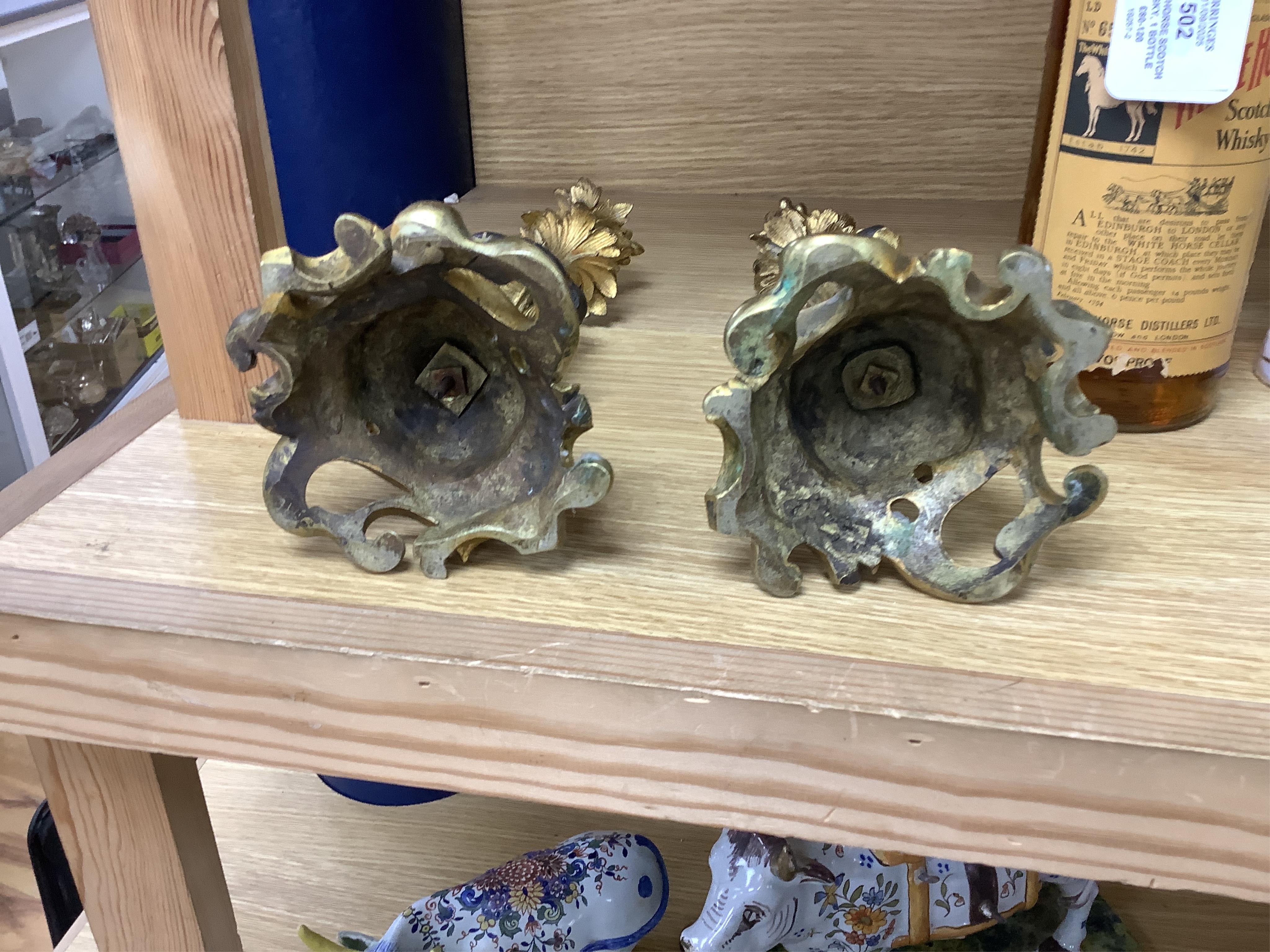 A pair of decorative French ormolu figural candlesticks, 25.5cm high